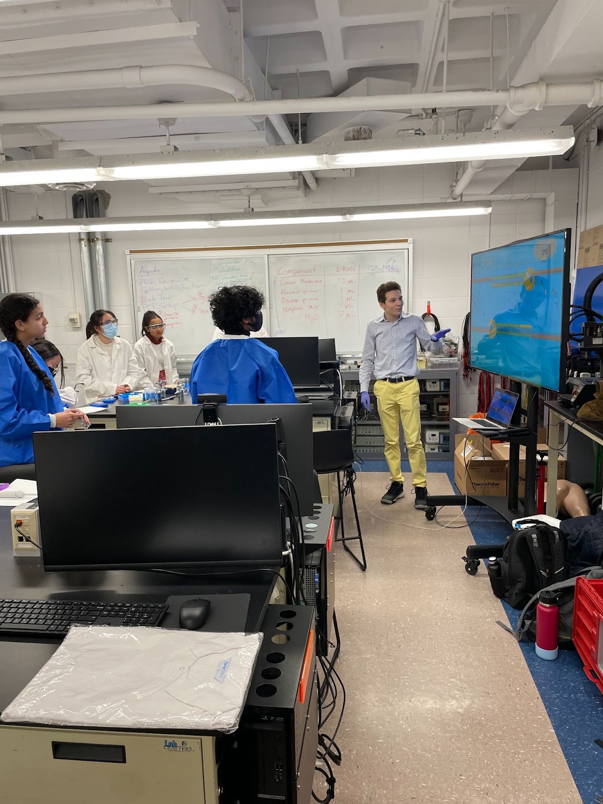 Project Lead and Instructor Theo Nelson reviewing the theory behind polymerase chain reactions during the fourth lab session. Photo Credit: Nicholas Djedjos
